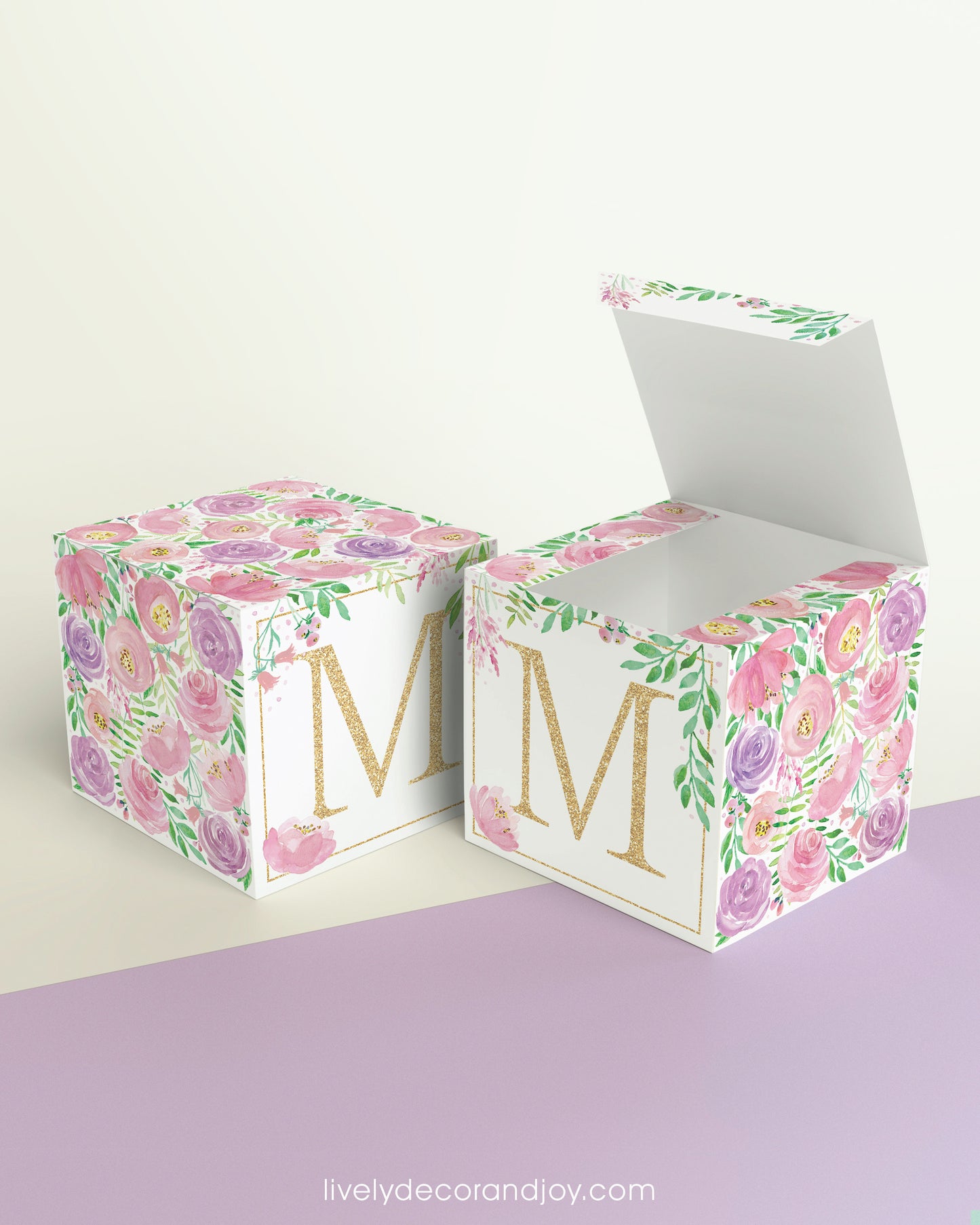 A completely closed block in the form of a cube and a box with an open lid. Both feature the same printable design.