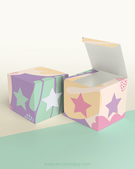 Paper building block and a star on the sides shown both as a cube and as an open box.