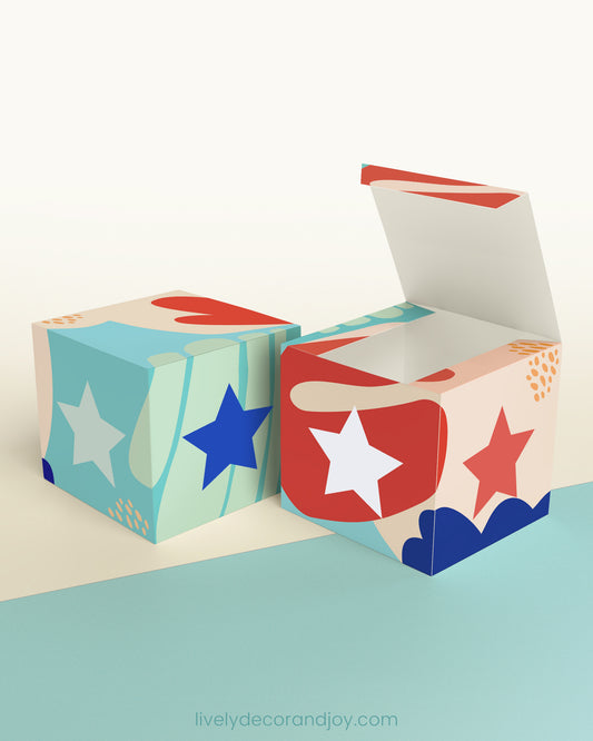Paper building block and a star on the sides shown both as a cube and as an open box.