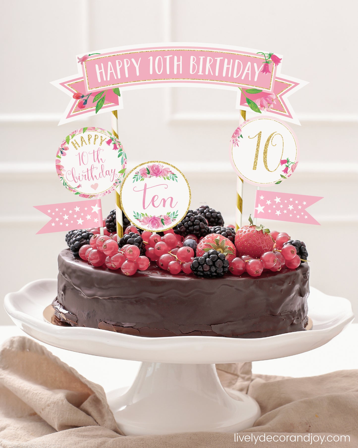Easy chocolate birthday cake topper made of printable party ribbon and label designs.