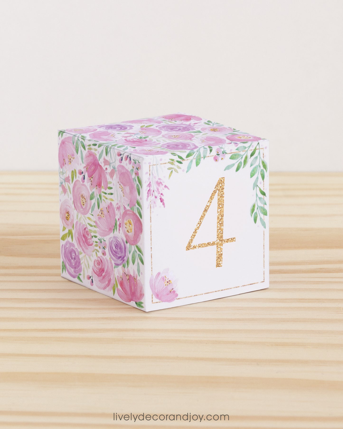 Building block with blush floral designs and peach number 4 on the front. Part of a collection of printable alphabet blocks.