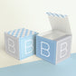 Two blocks side by side, one with the lid open to show that the printable cube template can also be used to make a box.