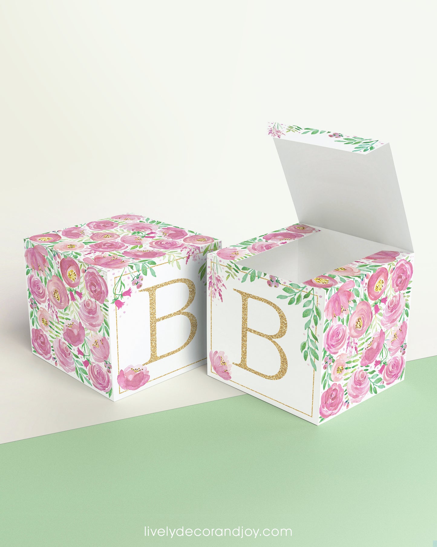 Two blocks side by side, one with the lid open to show that the printable cube template can also be used to make a box.