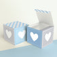 Two cubes with a heart on the sides. One has the lid open, showing it is a box. Both made with the same template.