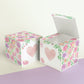 Two cubes with a heart on the front. One has the lid open, showing it is a box. Both made with the same template.