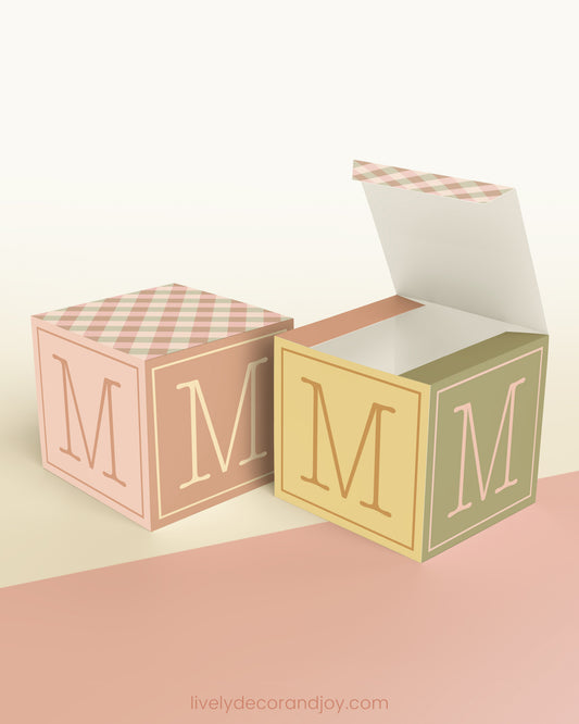 A completely closed block in the form of a cube and a box with an open lid. Both feature the same printable design.