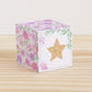Building block with floral designs and a large star on the front. Part of a collection of printable building blocks.