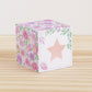 Building block with floral designs and a large star on the front. Part of a collection of printable building blocks.