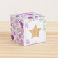 Building block with floral designs and gold star on the front. Part of a collection of printable alphabet building blocks.