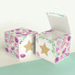 Paper building block with floral designs and a gold star on the front presented twice: as a cube and also as an open box.
