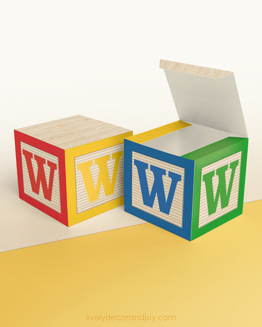 Letter block in primary colors with the letter W on the sides. It is made of paper.