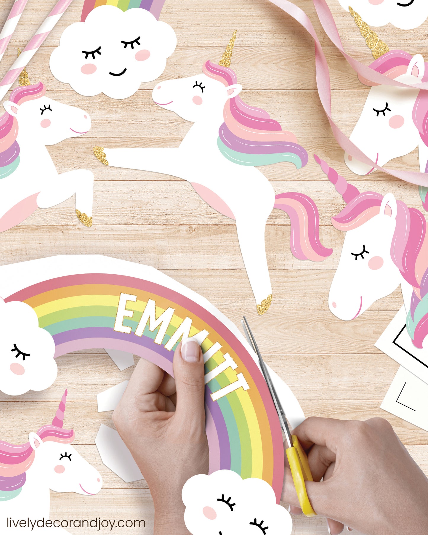 DIY rainbow cake topper with a personalized name and beautiful unicorns.