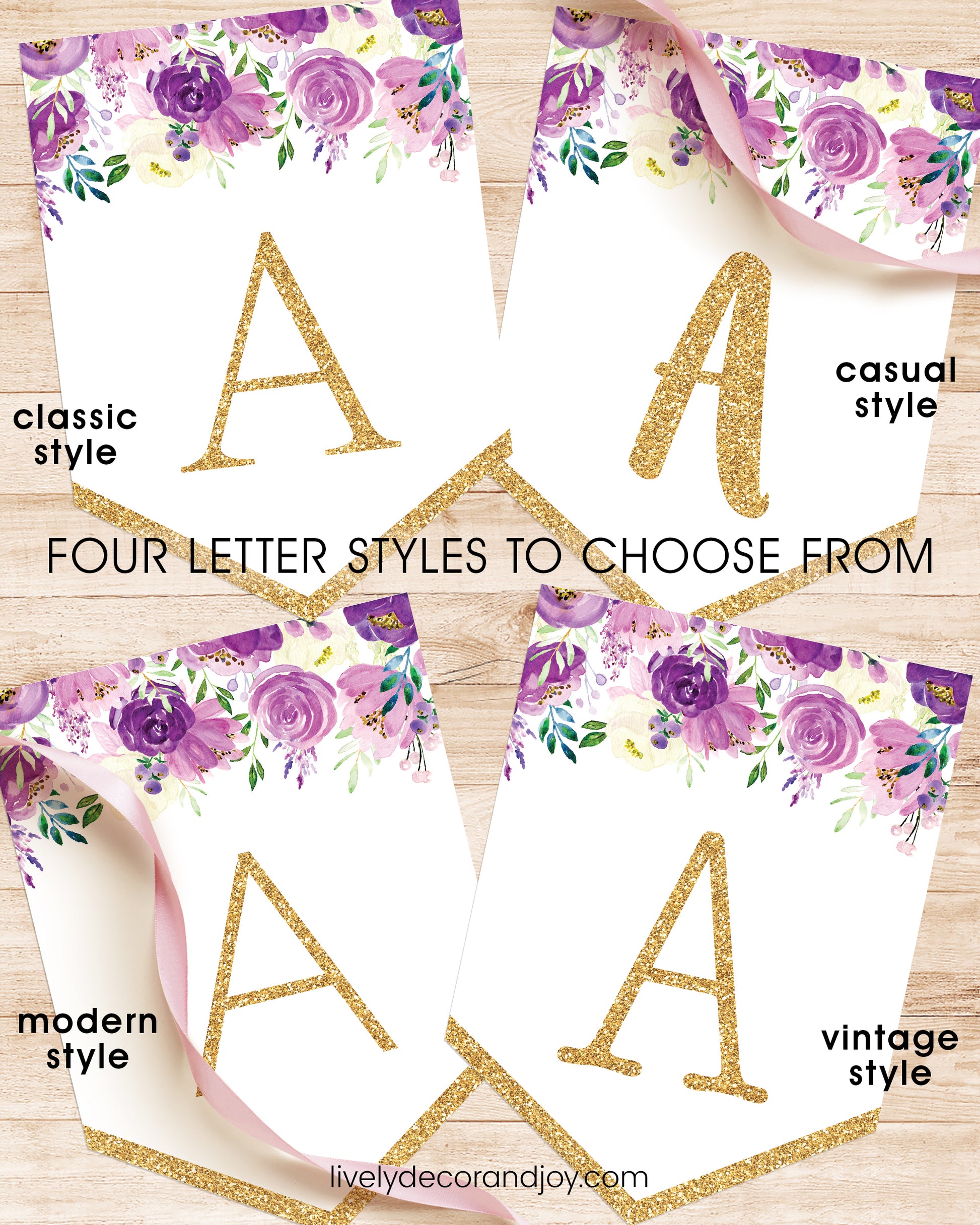 On a wood table, four banner flags with the same purple floral designs show font styles to choose from. All letters in gold.