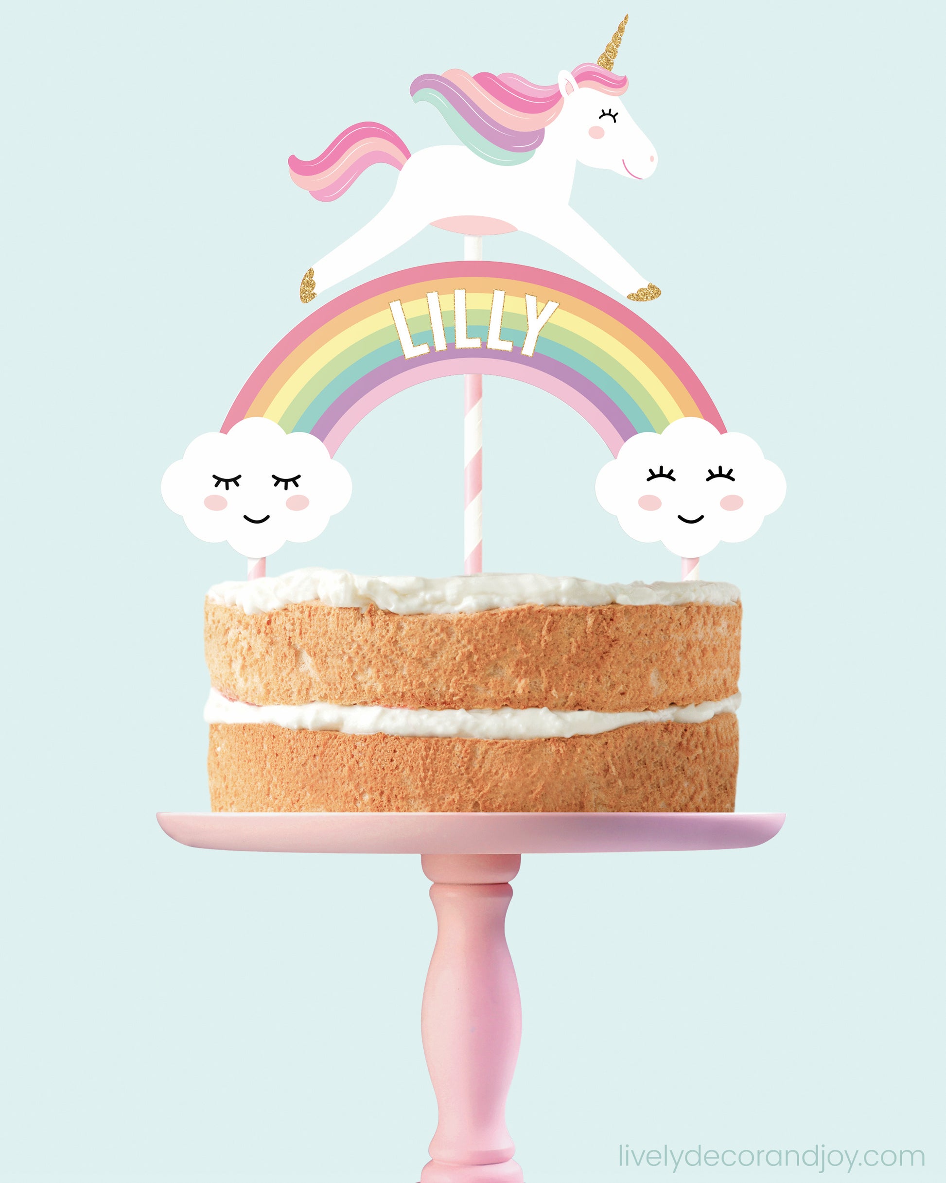 Personalized cake decoration with a name rainbow and optional unicorns in pink.