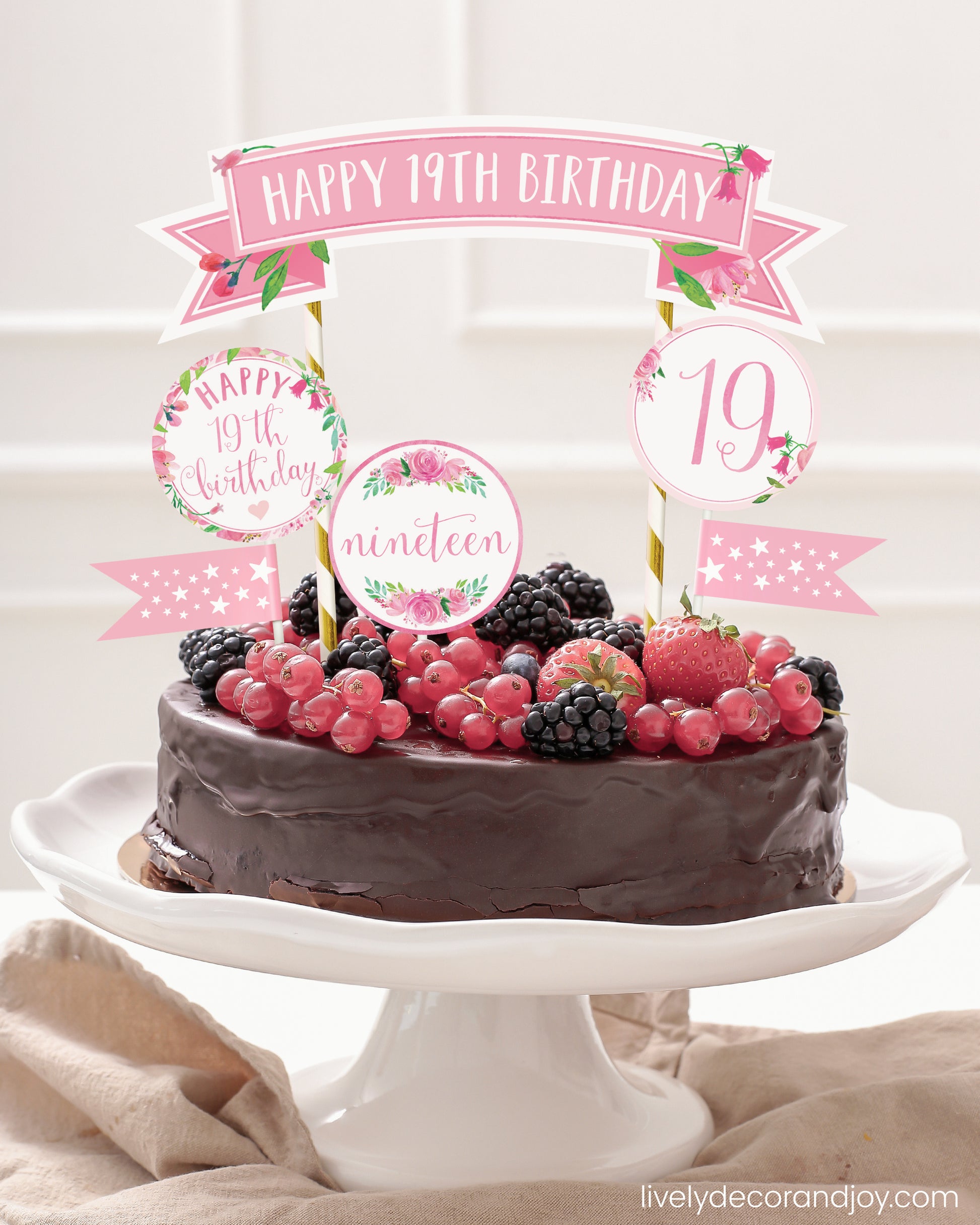 Easy chocolate birthday cake topper made of printable DIY party decorations.