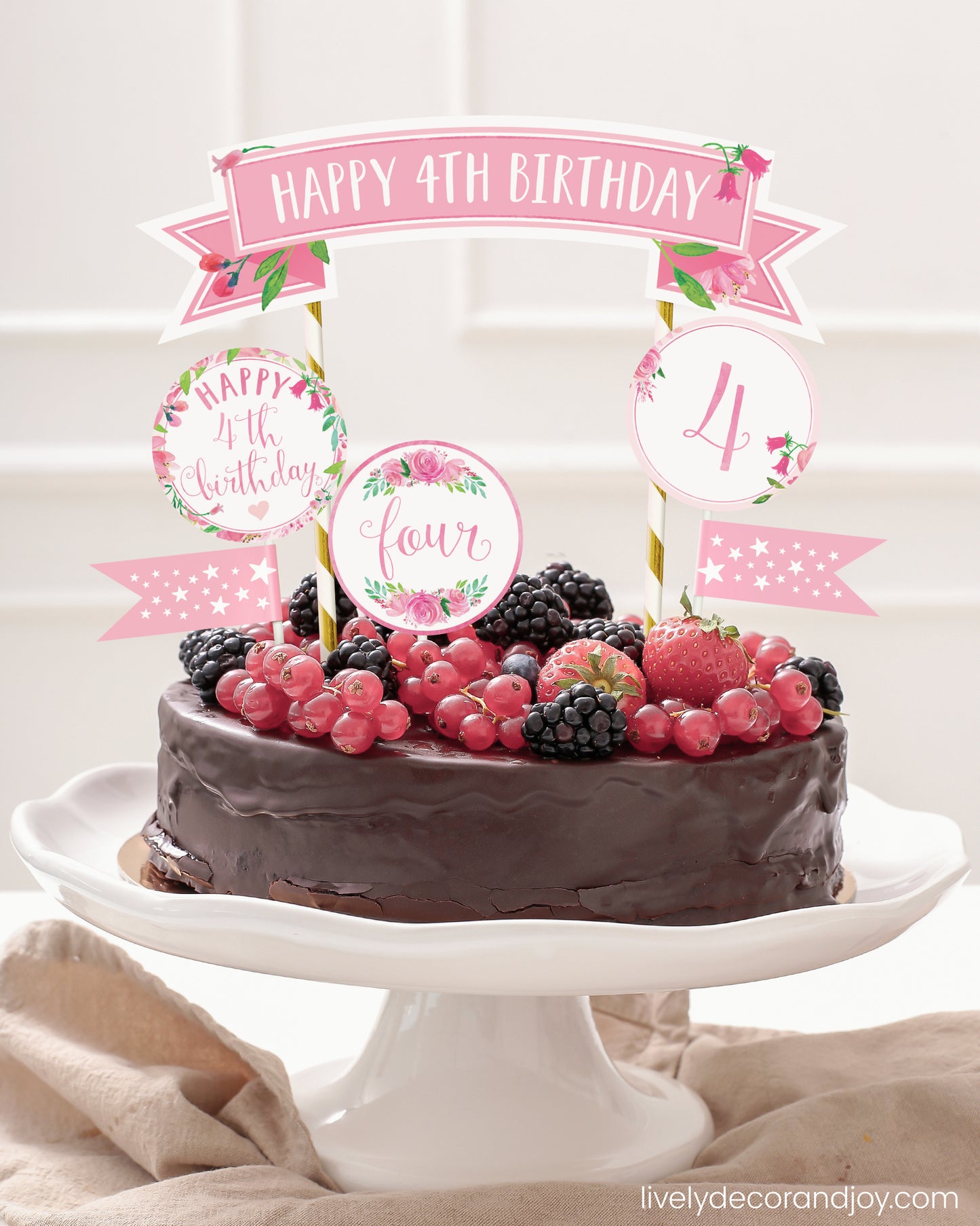 Easy chocolate birthday cake topper made of printable party ribbon and label designs.