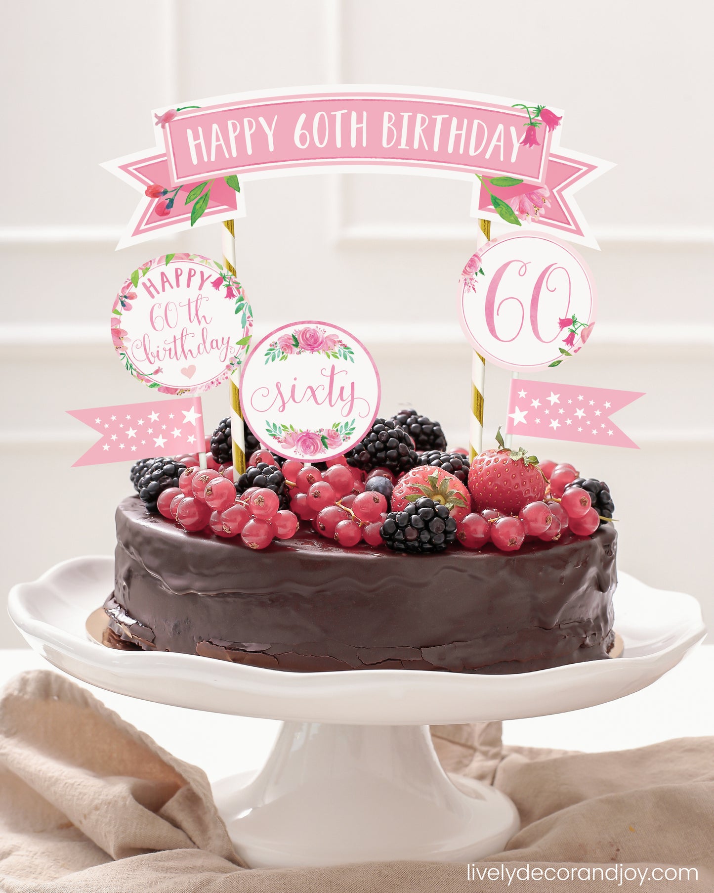 Easy chocolate birthday cake topper made of printable DIY party decorations.