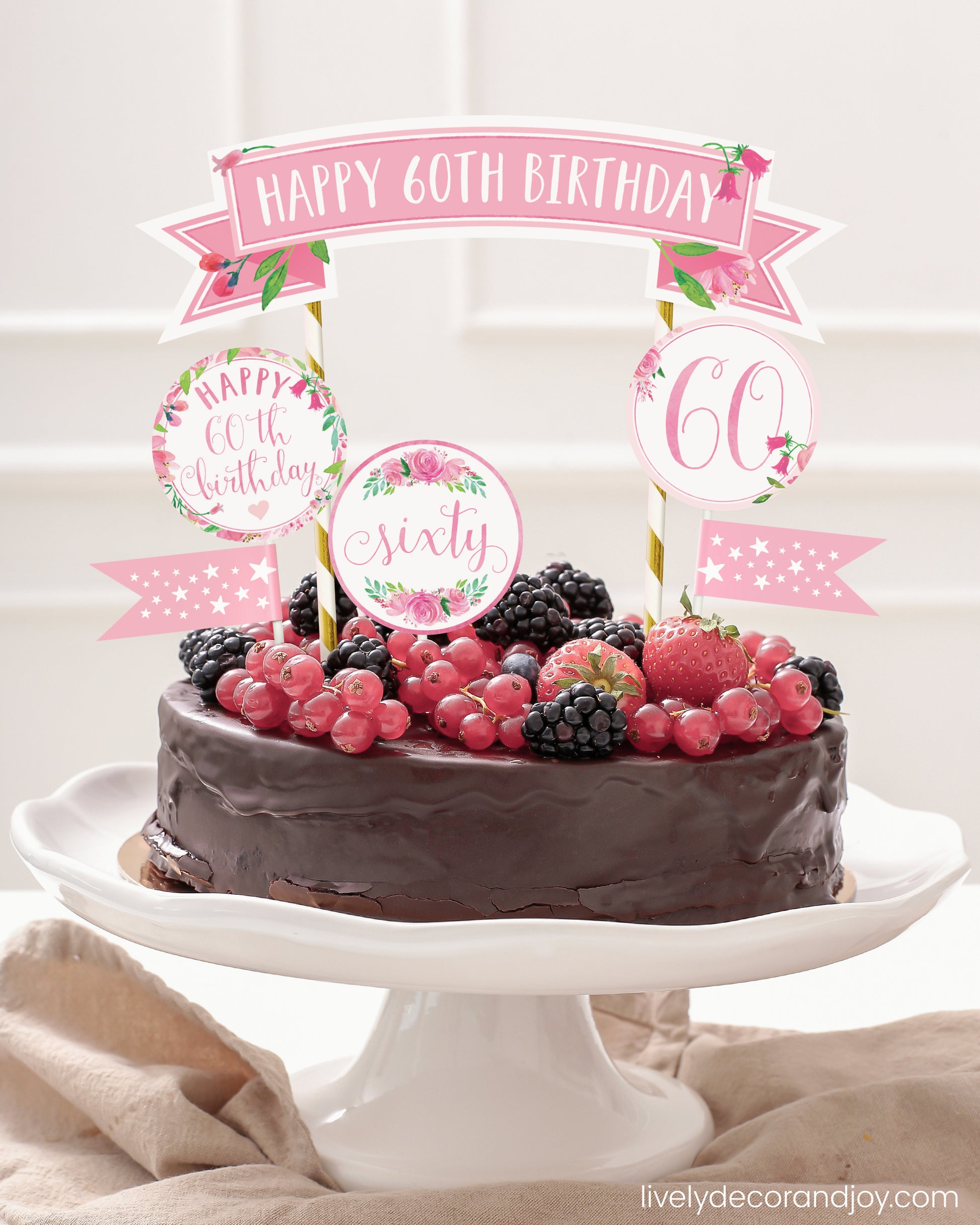 Easy chocolate birthday cake topper made of printable DIY party decorations.