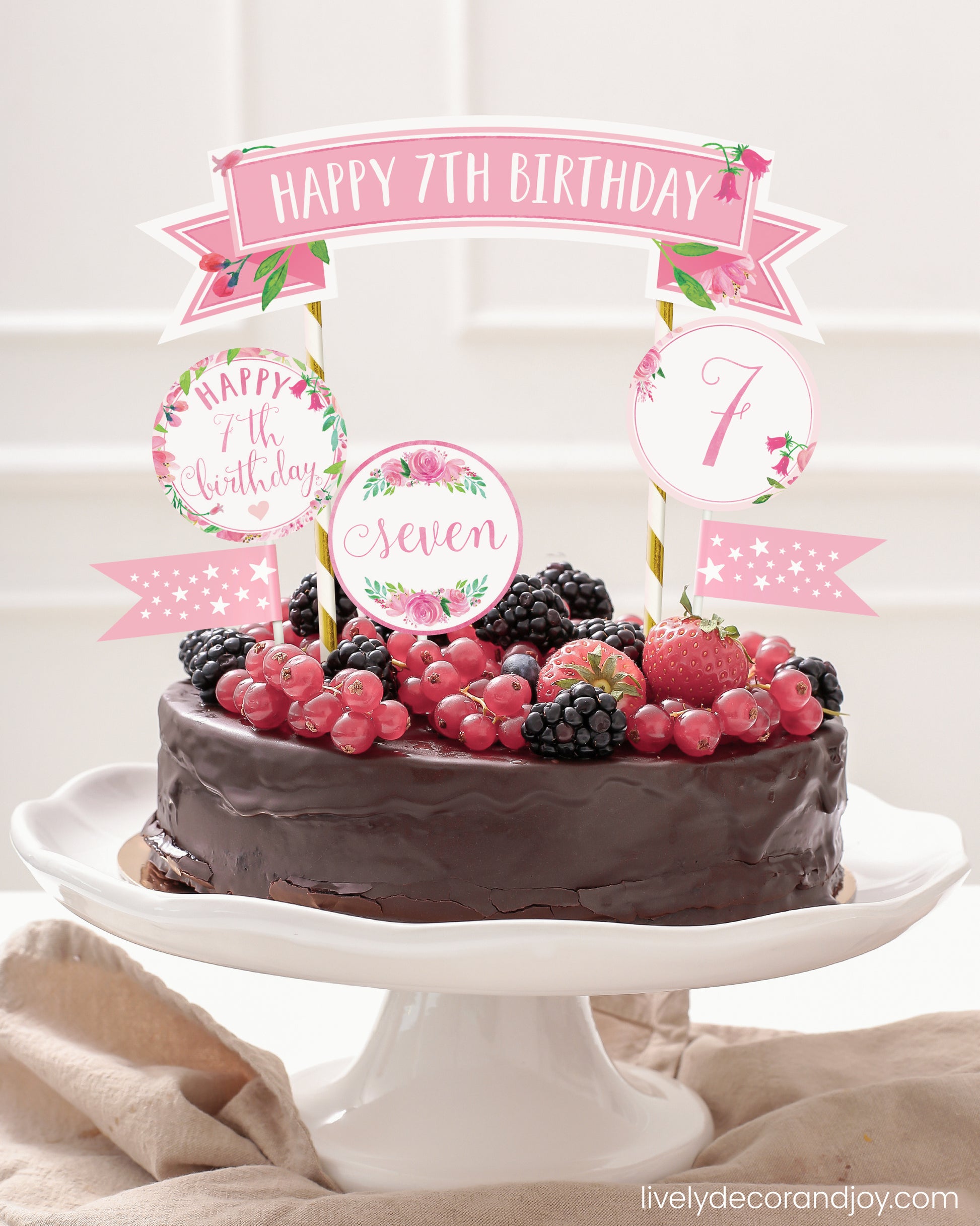 Easy chocolate birthday cake topper made of printable DIY party decorations.