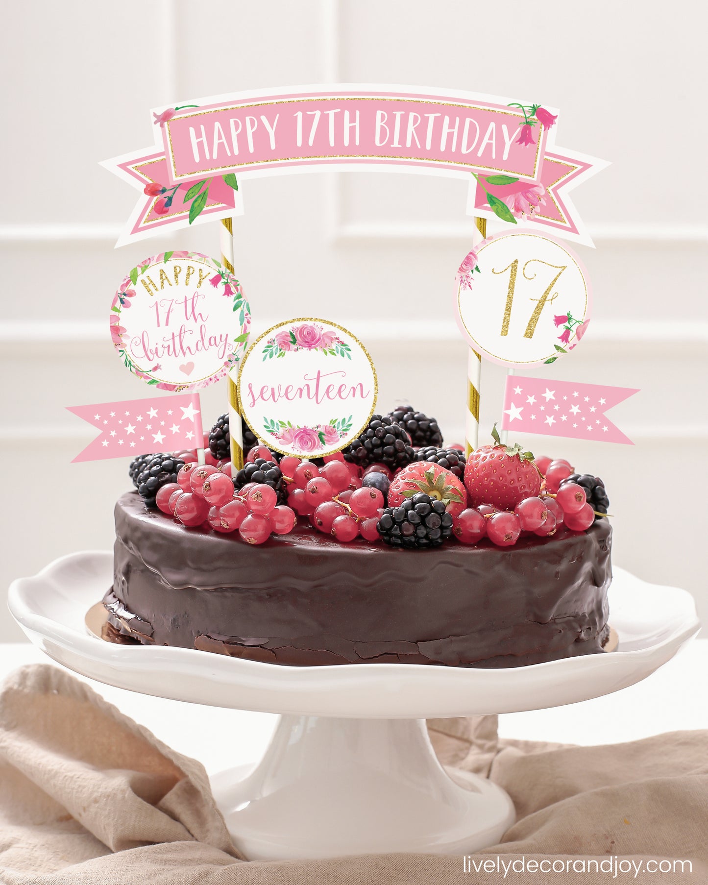 Easy chocolate birthday cake topper made of printable party ribbon and label designs.