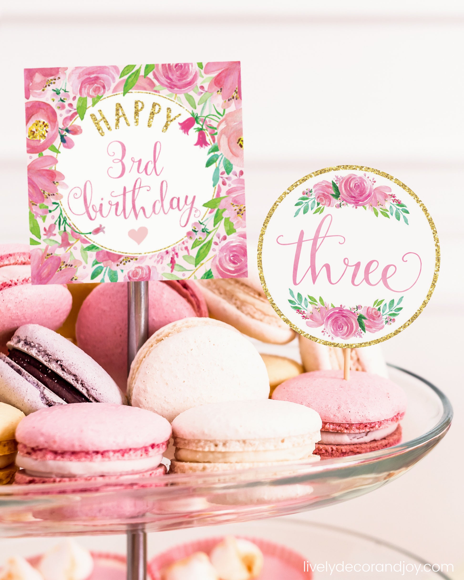 One square tag and one round tag used as easy party decorations at a macaron stand in a princess party.