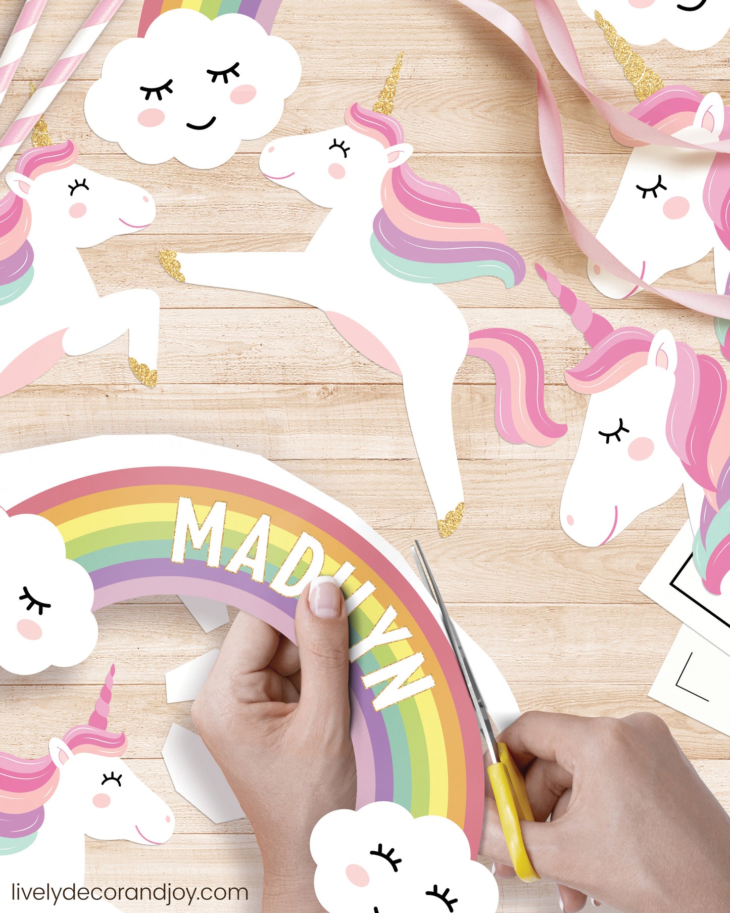 DIY rainbow cake topper with a personalized name and beautiful unicorns.