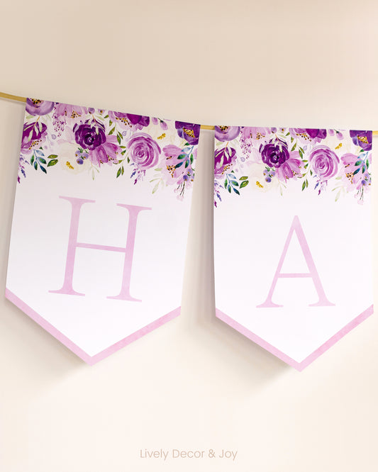 Banner flags on a wall: a Happy Birthday banner or Happy Retirement banner. They have floral designs and letters in pink.